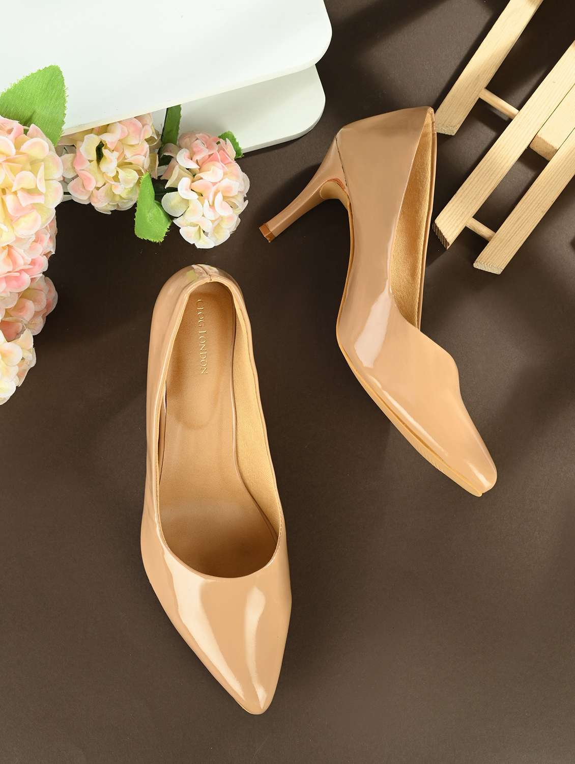 beige synthetic slip on pumps
