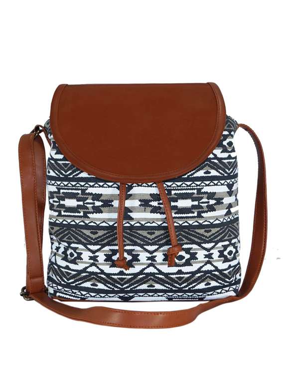green canvas sling bag