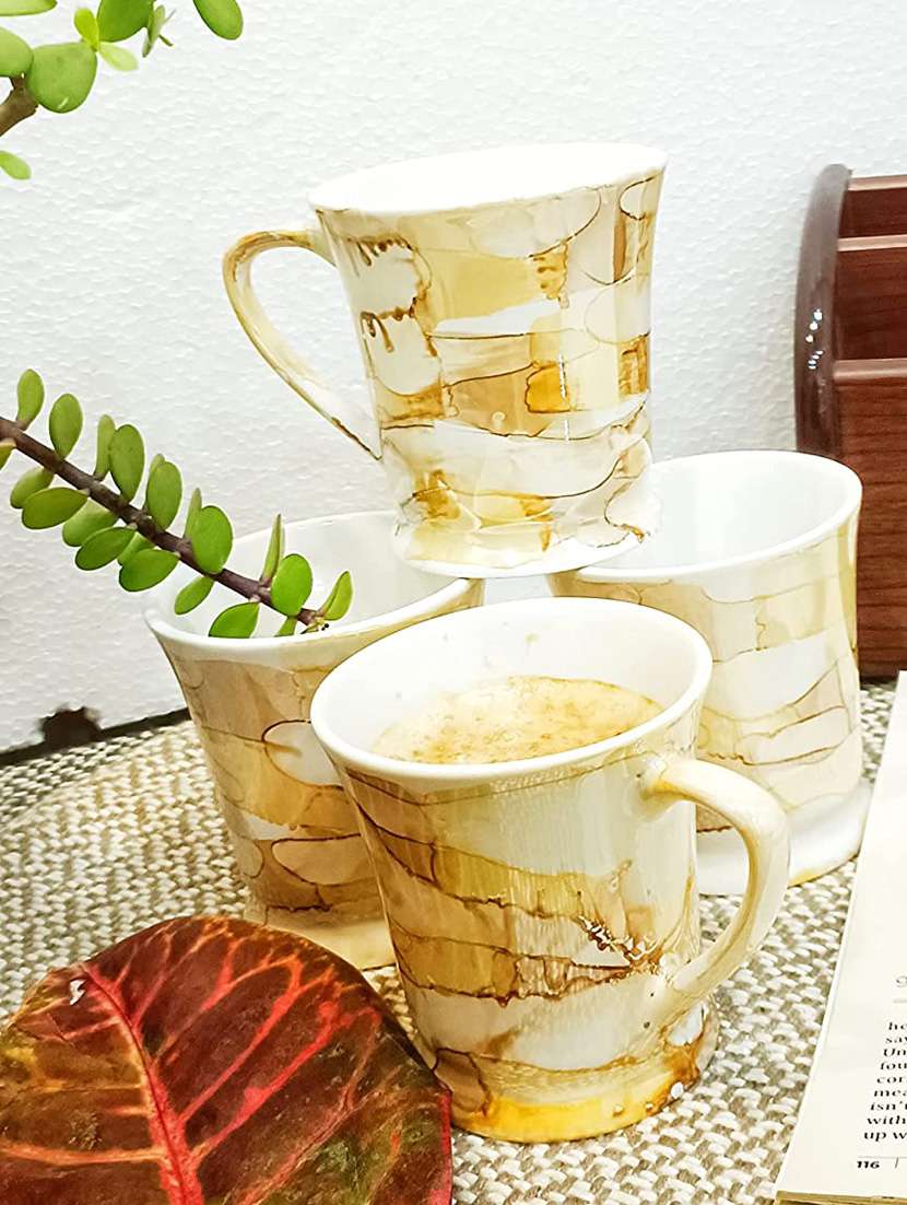 caffeine ceramic handmade yellow & gold tea cup set (set of 4) - 19408756 -  Standard Image - 1