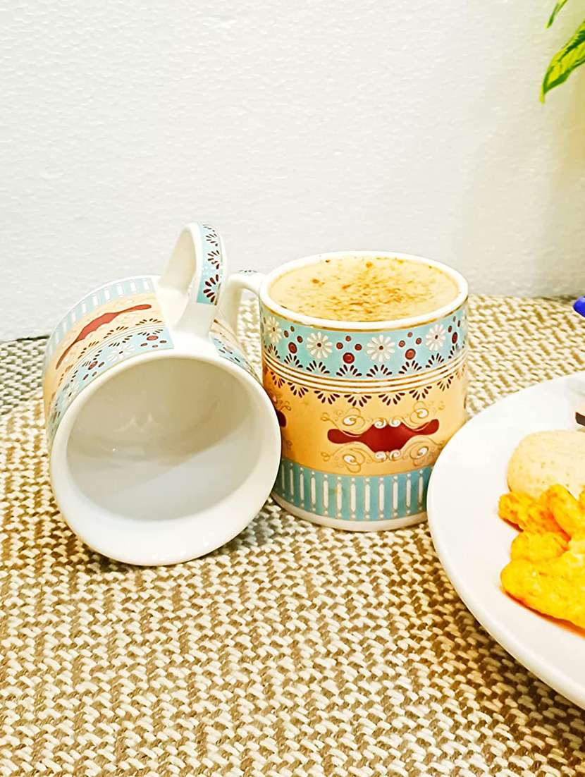 caffeine ceramic handmade multicolor tea cup set (set of 2) - 19408769 -  Standard Image - 1