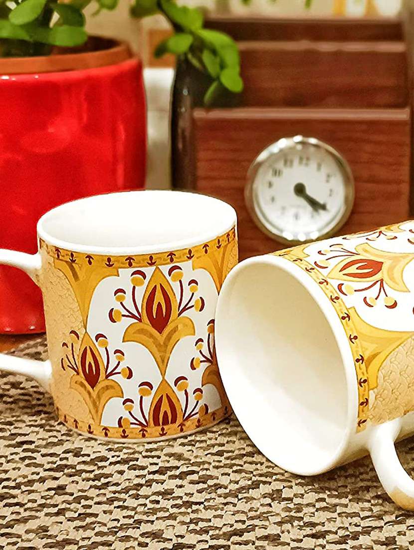 caffeine ceramic handmade yellow gold pattern tea cup set (set of 2) - 19408772 -  Standard Image - 1
