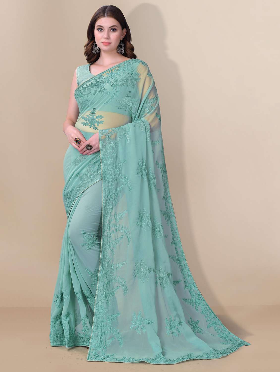turquoise georgette embroidered saree with blouse