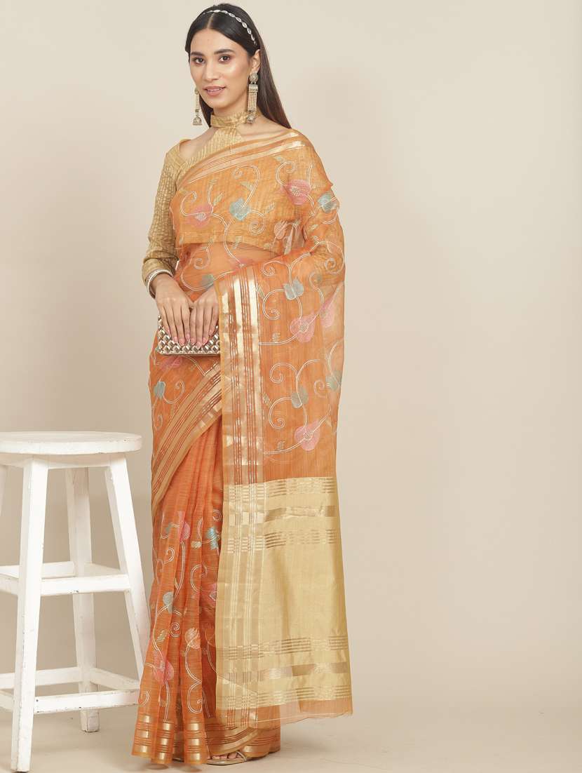 women's self design peach colored saree with blouse