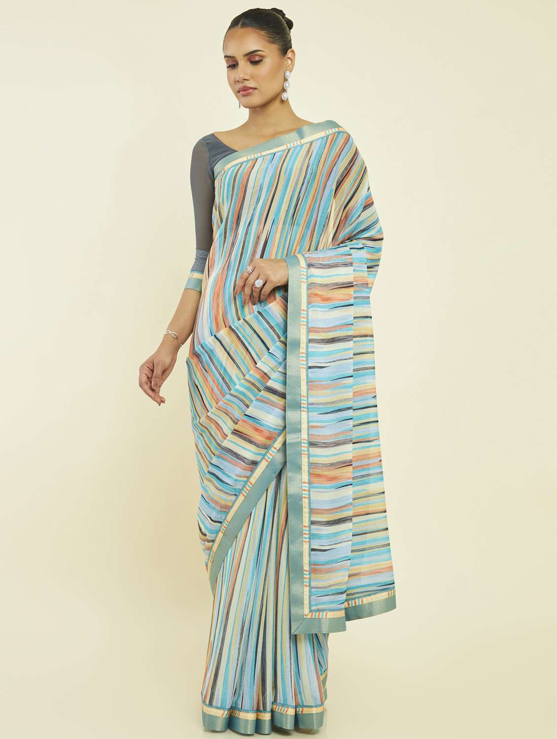 women's printed turquoise colored saree with blouse