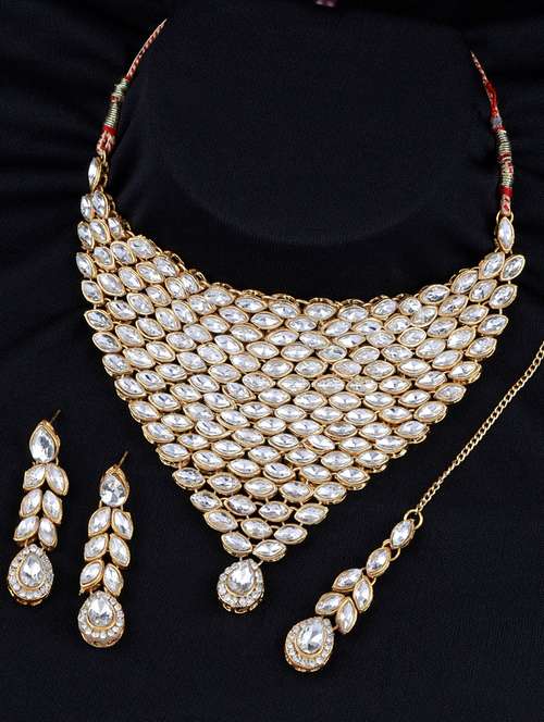 gold brass necklaces and earring - 19693775 - Standard Image - 0