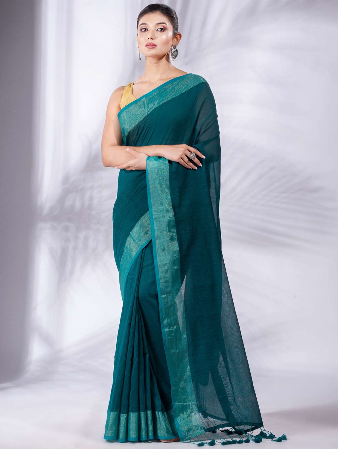 women's bordered royal blue colored saree with blouse