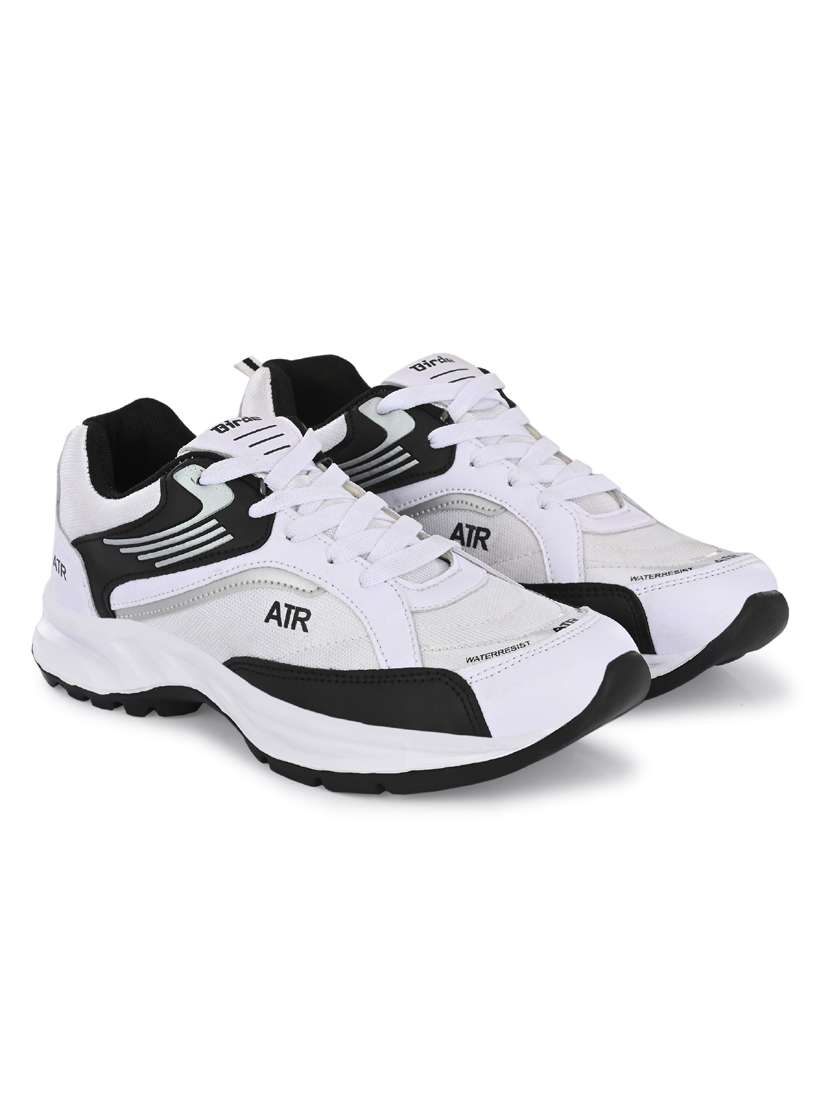 men lace up sports shoes