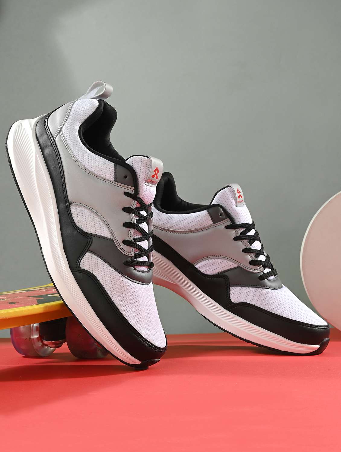 white synthetic sport shoe