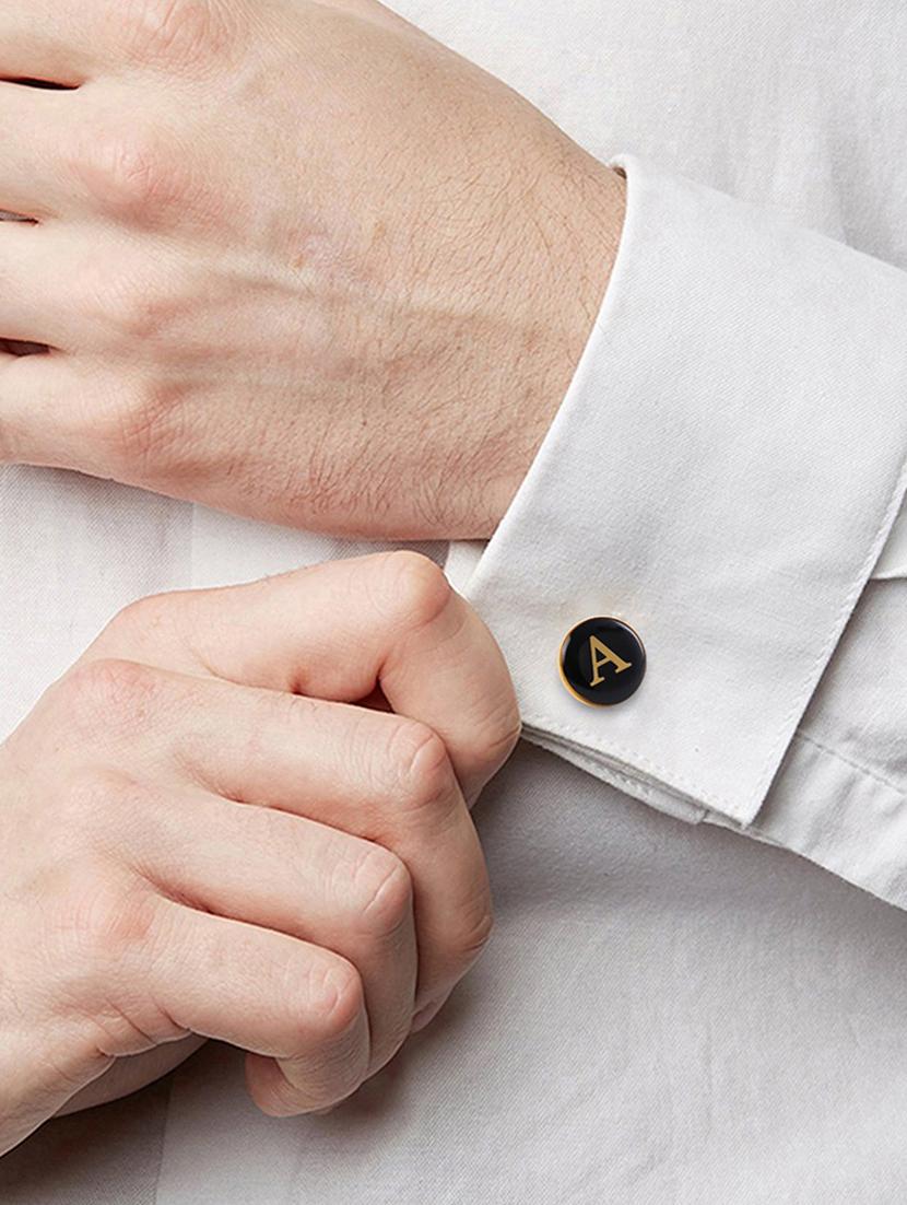 black metal cufflink - 19761368 -  Standard Image - 1