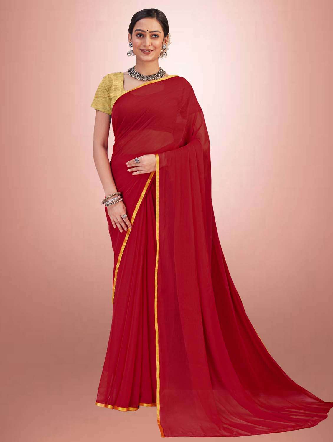 women's solid maroon colored saree with blouse