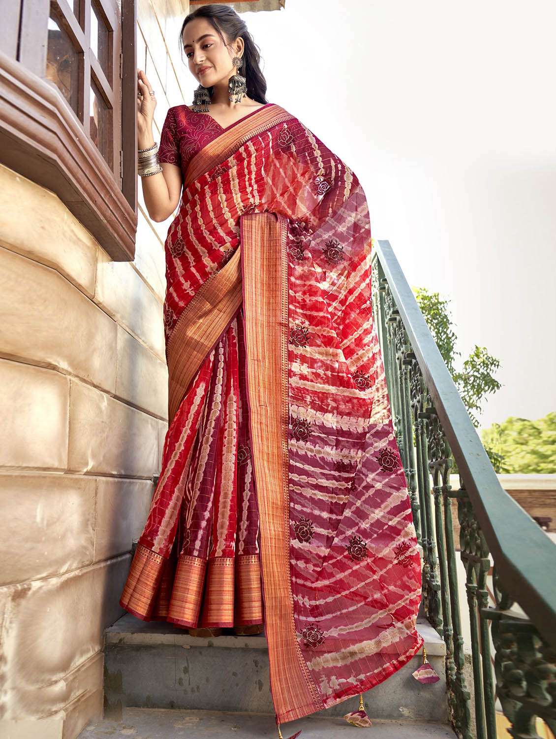women's floral maroon colored saree
