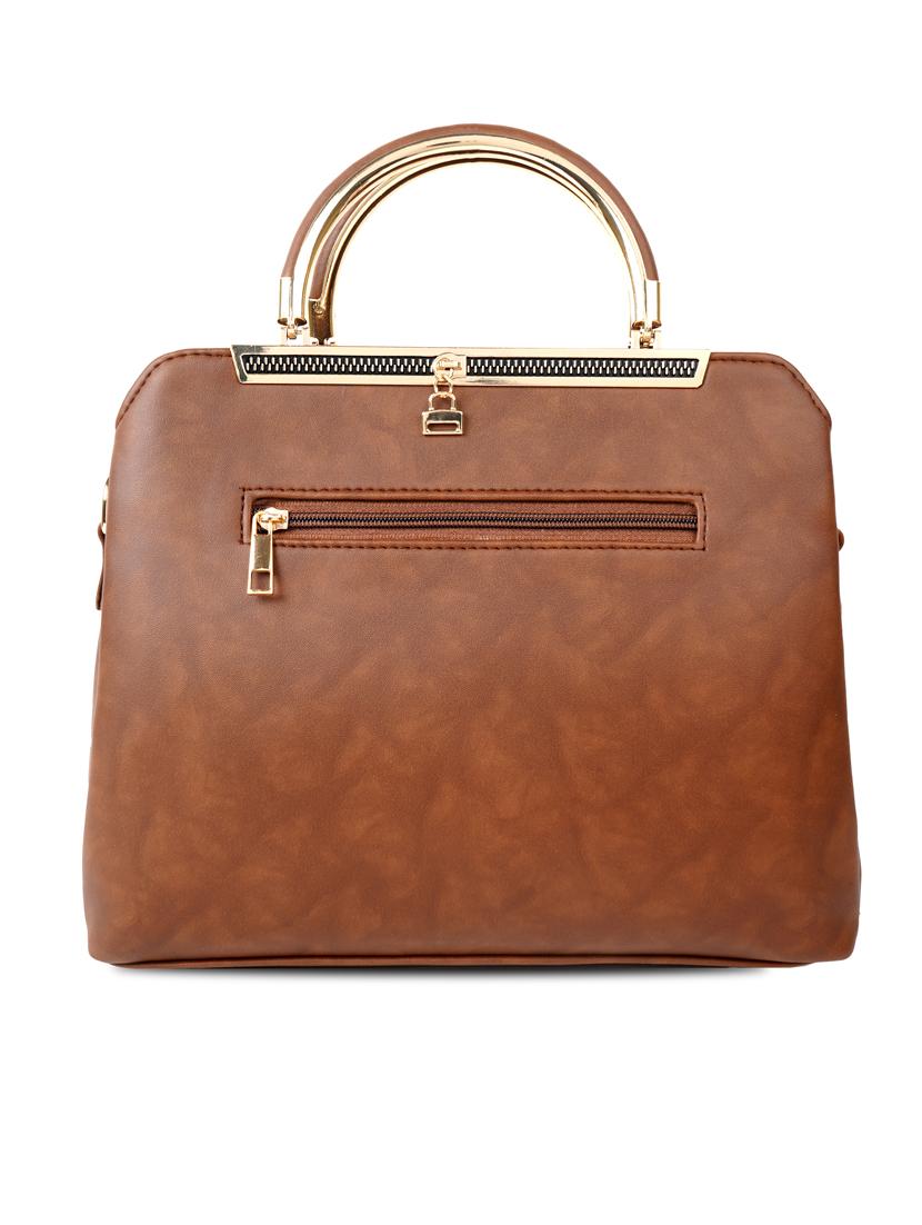 tan solid handbag - 19956582 -  Standard Image - 1