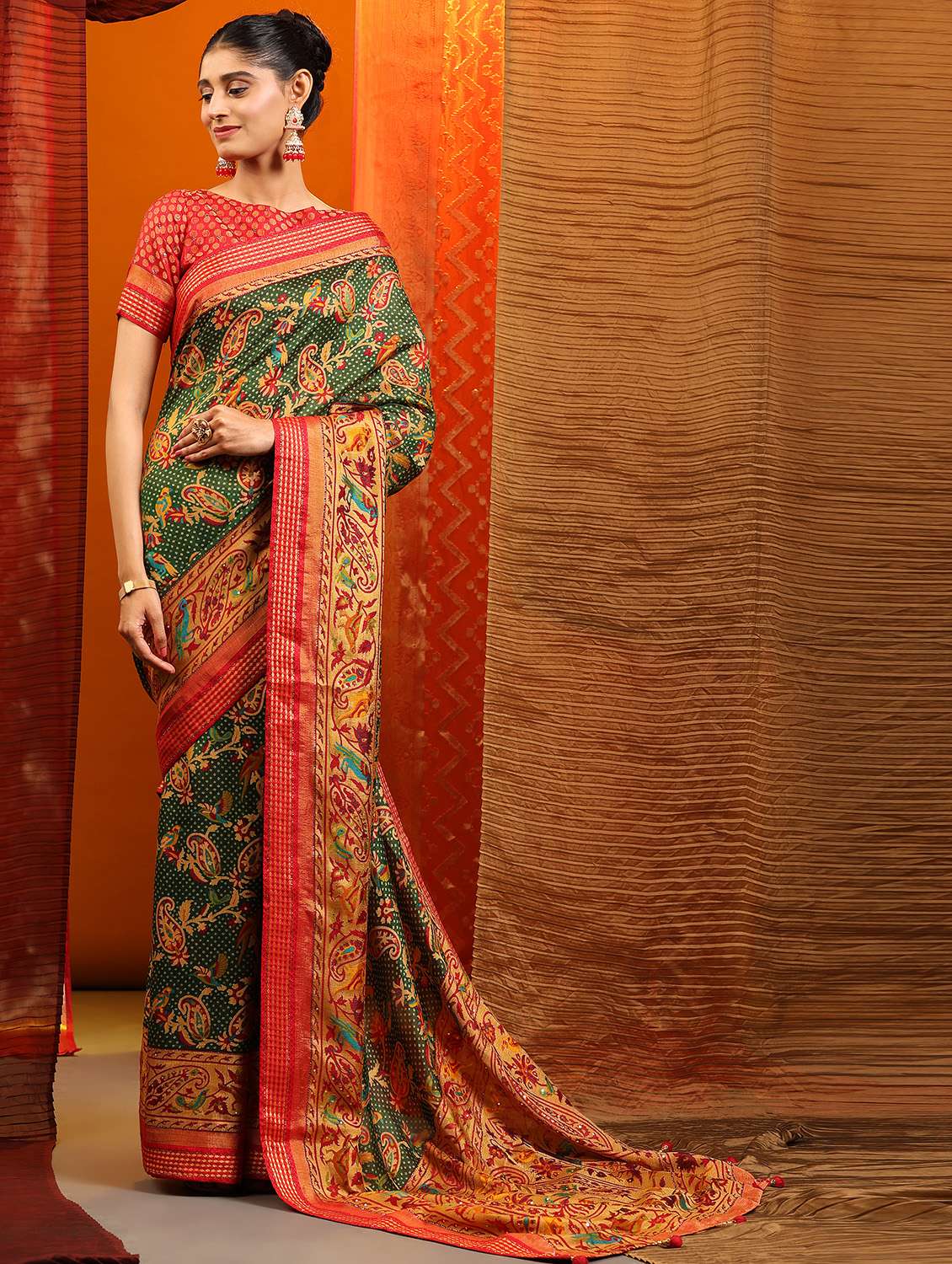 women's ikat green colored saree with blouse