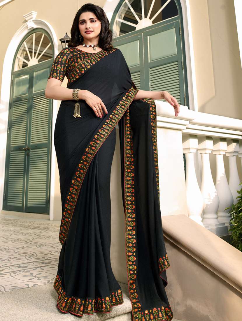 women's bordered black colored saree with blouse