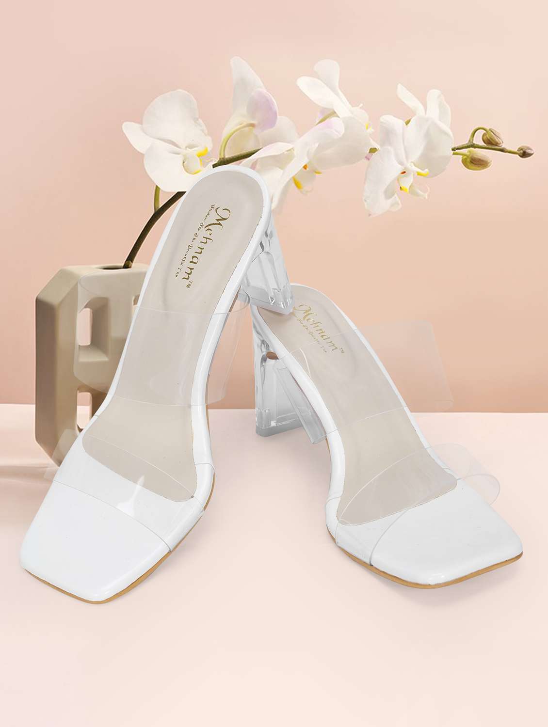 white synthetic slip on sandals