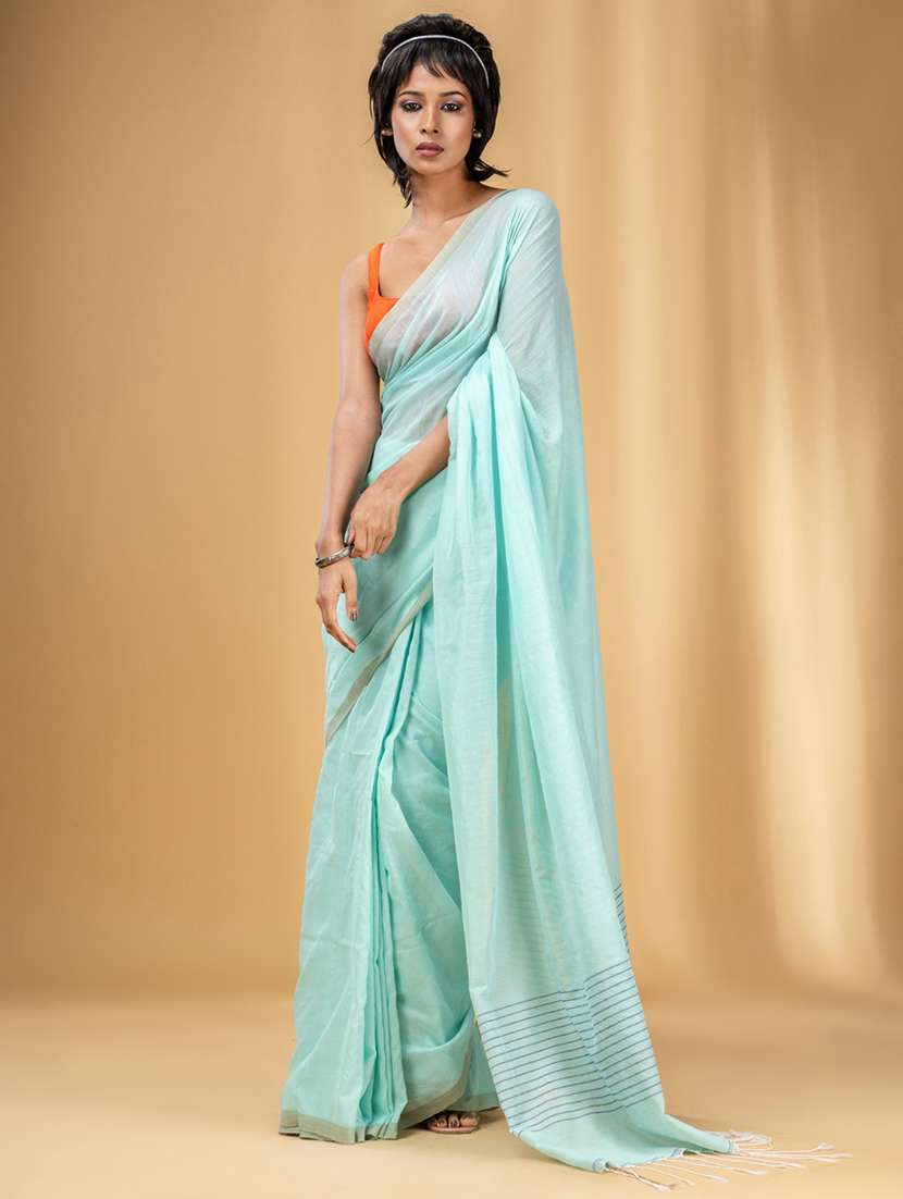 women's solid green colored saree with blouse