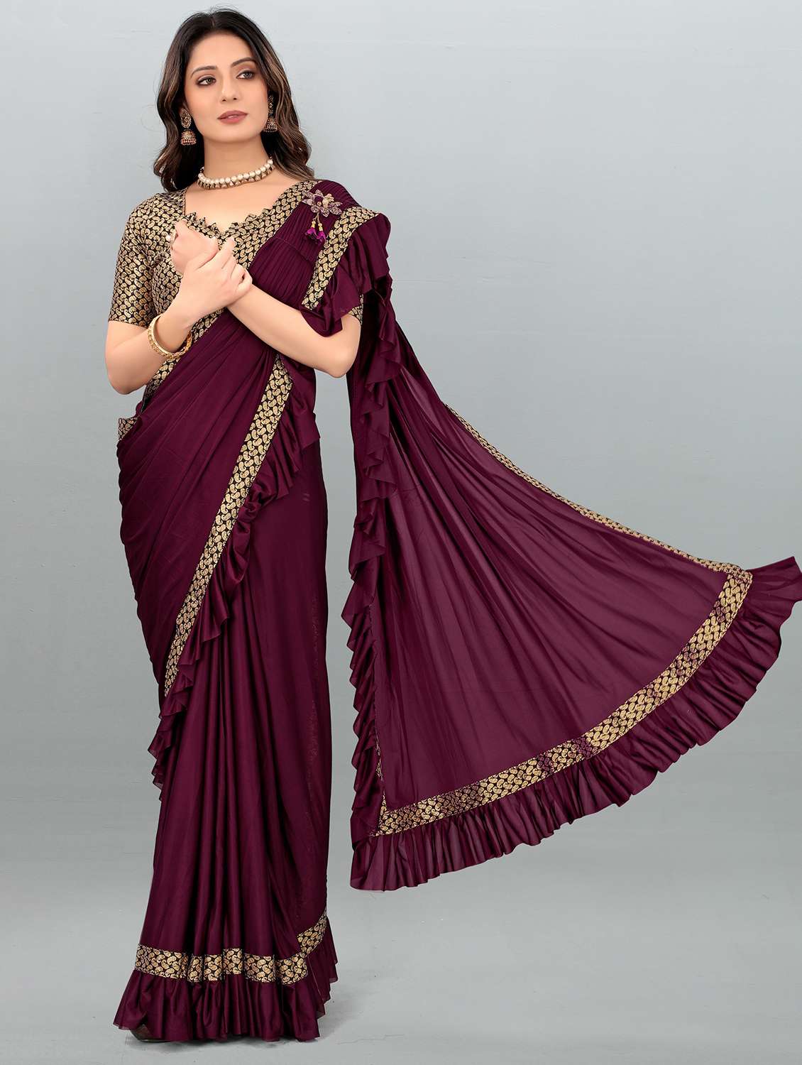women's bordered magenta colored saree with blouse