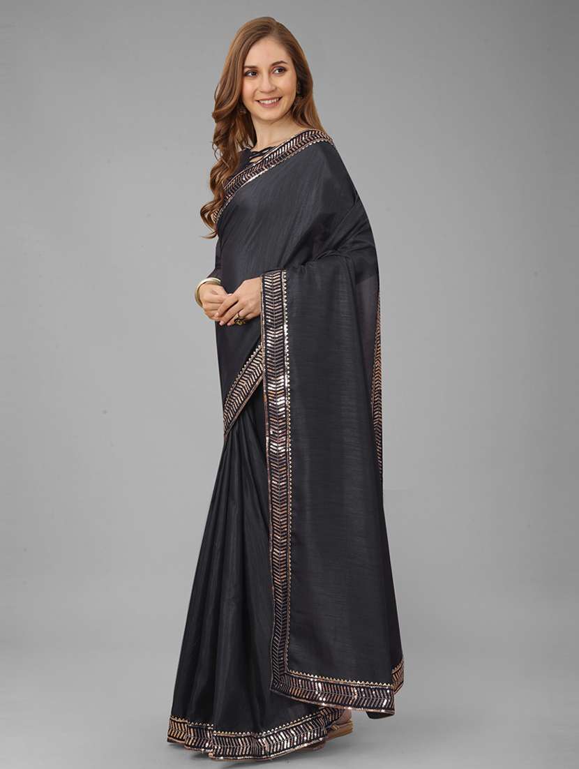 women's bordered black colored saree with blouse