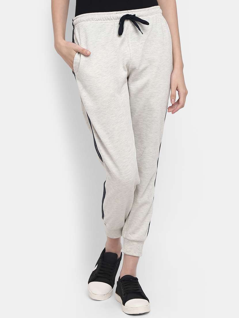 women solid mid rise track pants