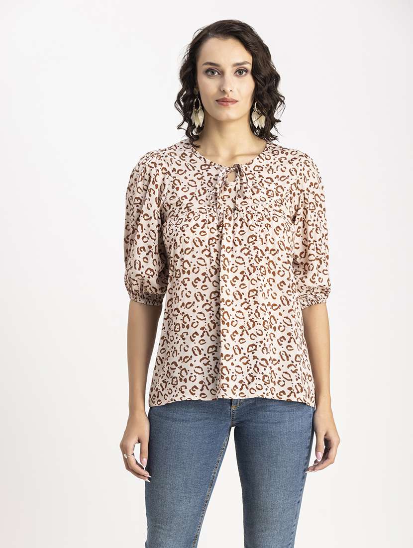 beige animal print a-line top
