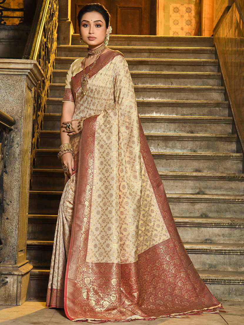 women's self design beige colored saree with blouse
