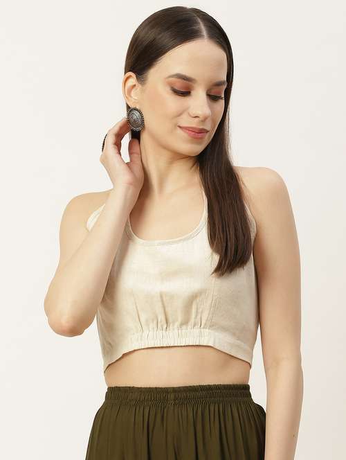 women beige solid stitched blouse