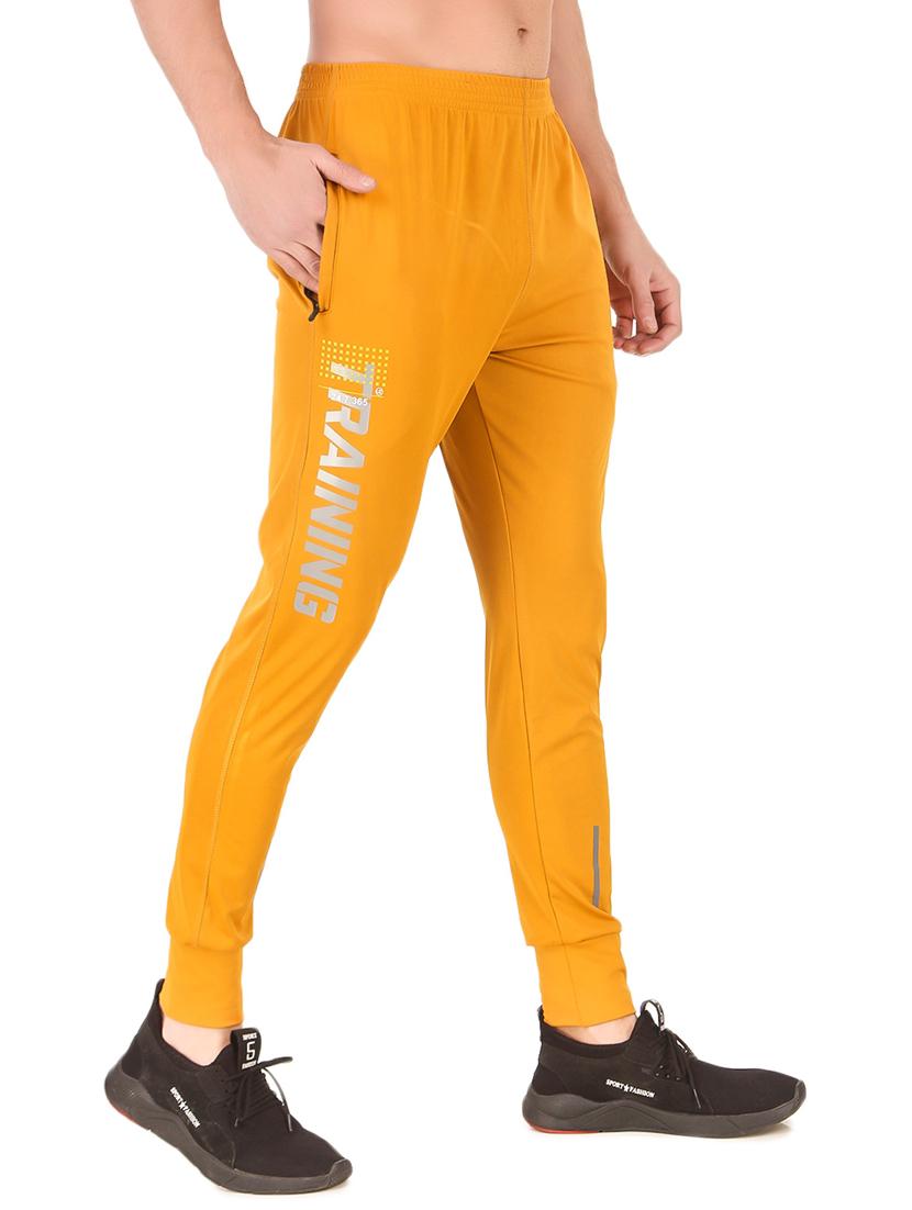 men mustard placement print mid rise jogger - 20502216 -  Standard Image - 1