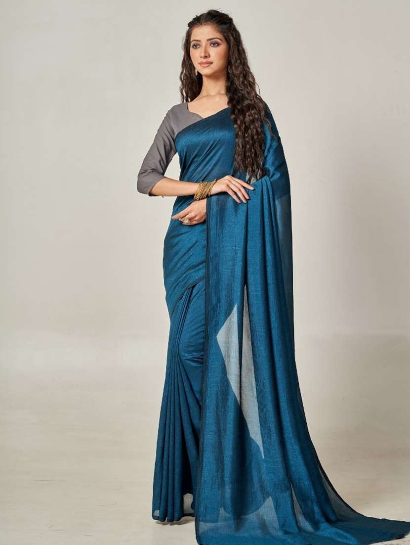 women's solid teal colored saree with blouse