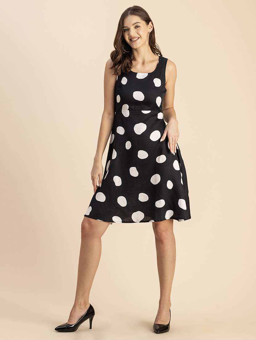 women polka doted sleeveless dress