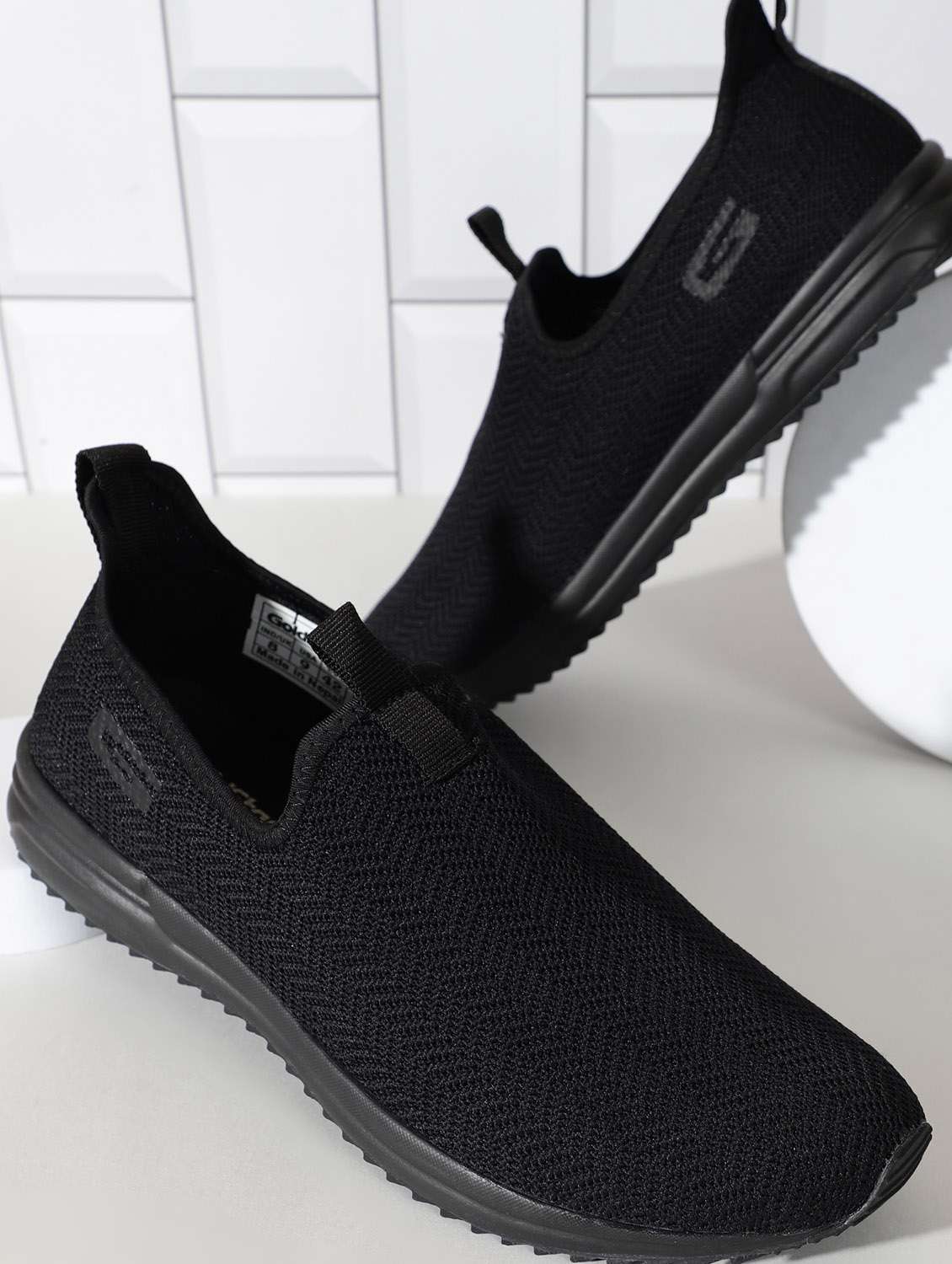 black walking  slip on sport shoe - 20764692 -  Standard Image - 1