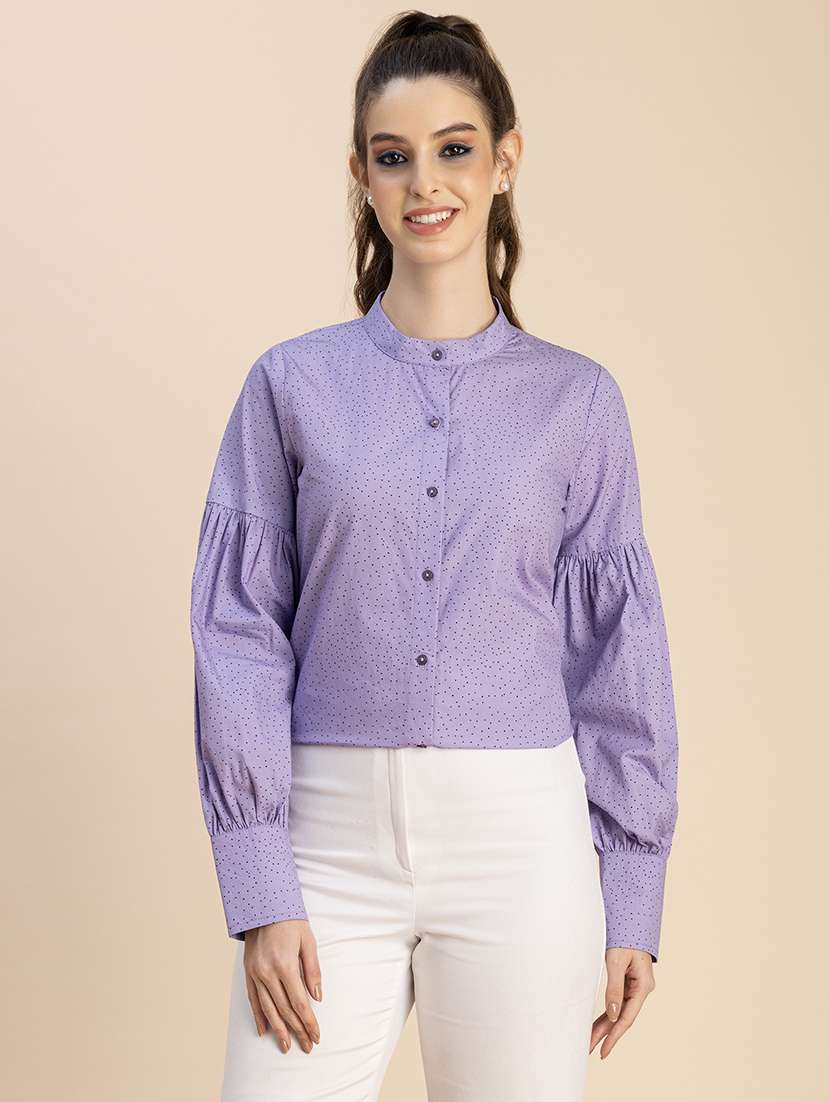 women polka doted bishop sleeves shirt