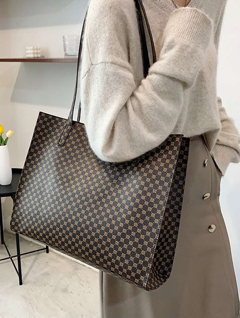 brown printed handbag - 20806349 -  Standard Image - 4