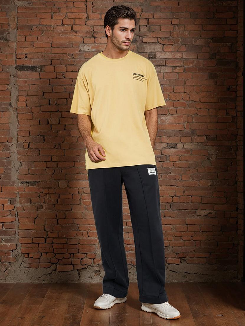 men loose fit placement print full length track pant - 20806382 -  Zoom Image - 0