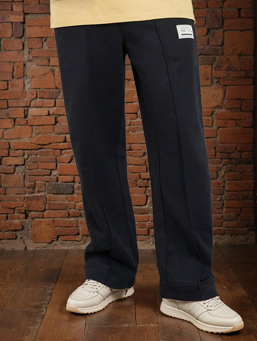 men loose fit placement print full length track pant - 20806382 -  Standard Image - 1