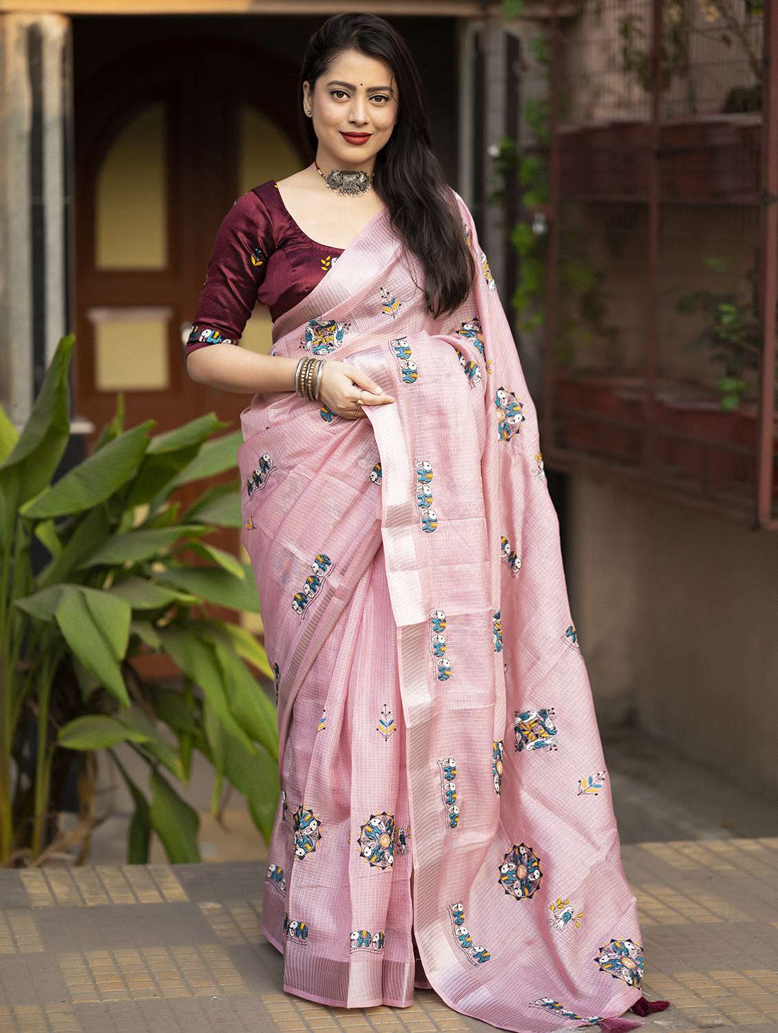 women pink embroidered saree