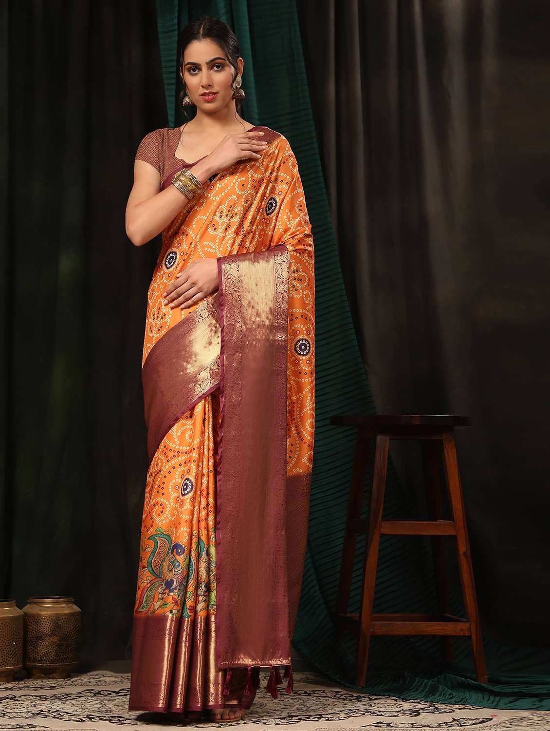 women orange bandhani bordered saree with blouse