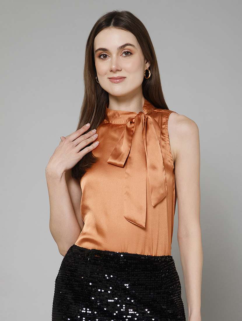 women rust solid sleeveless regular top