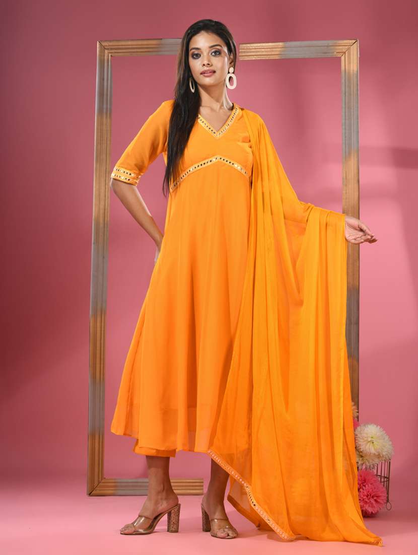 women orange elbow sleeve kurta pant with dupatta set