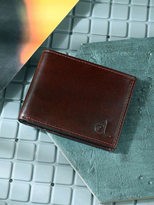 brown leather wallet - 20980365 -  Standard Image - 0
