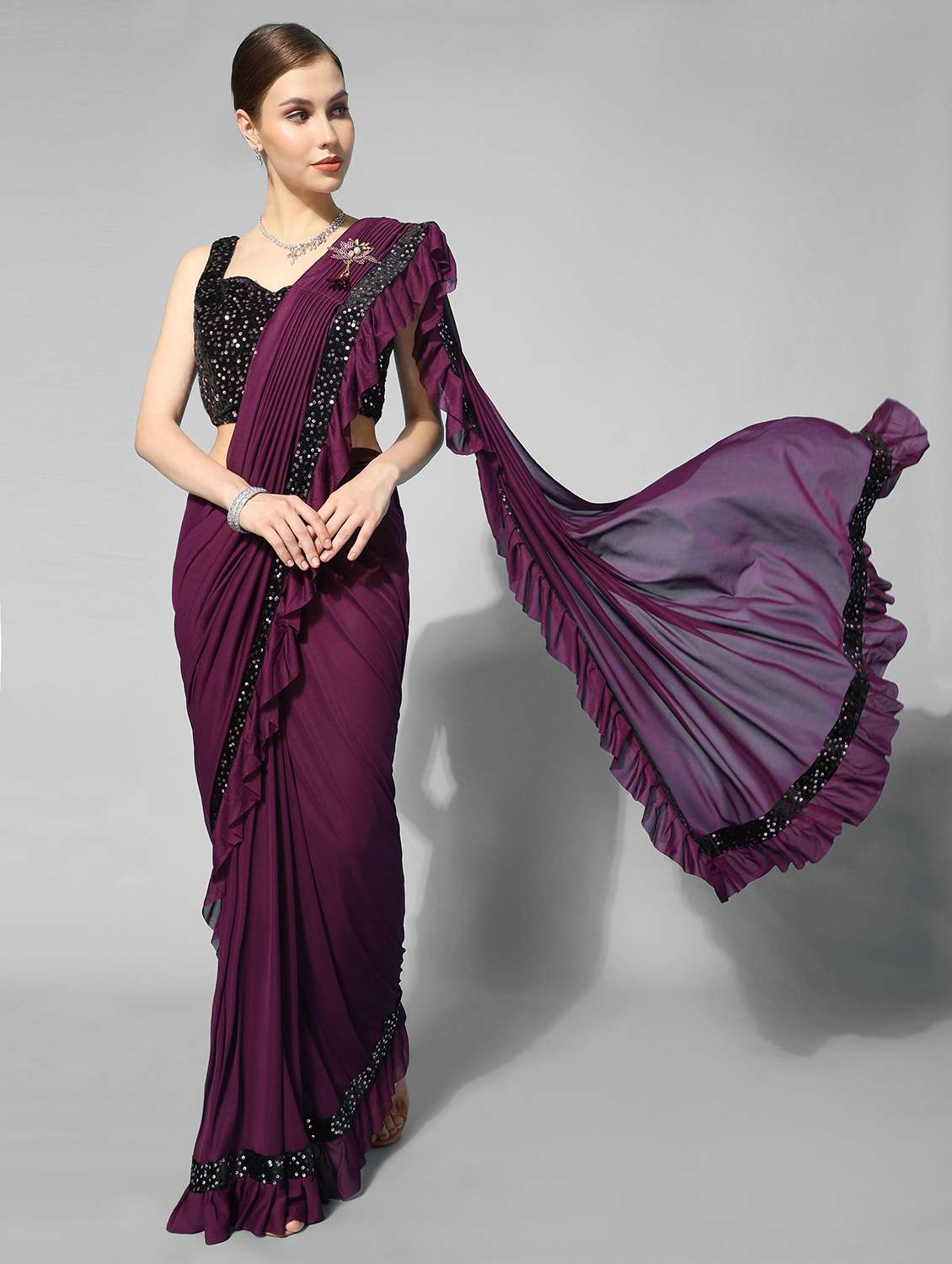 women purple solid lace work ruffle saree with blouse