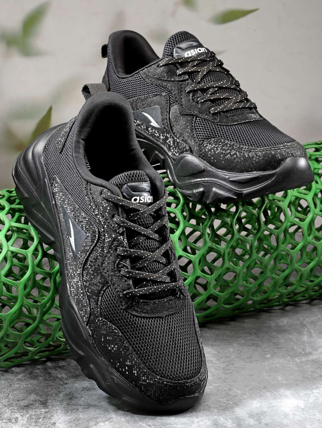 black lace-up sports shoes