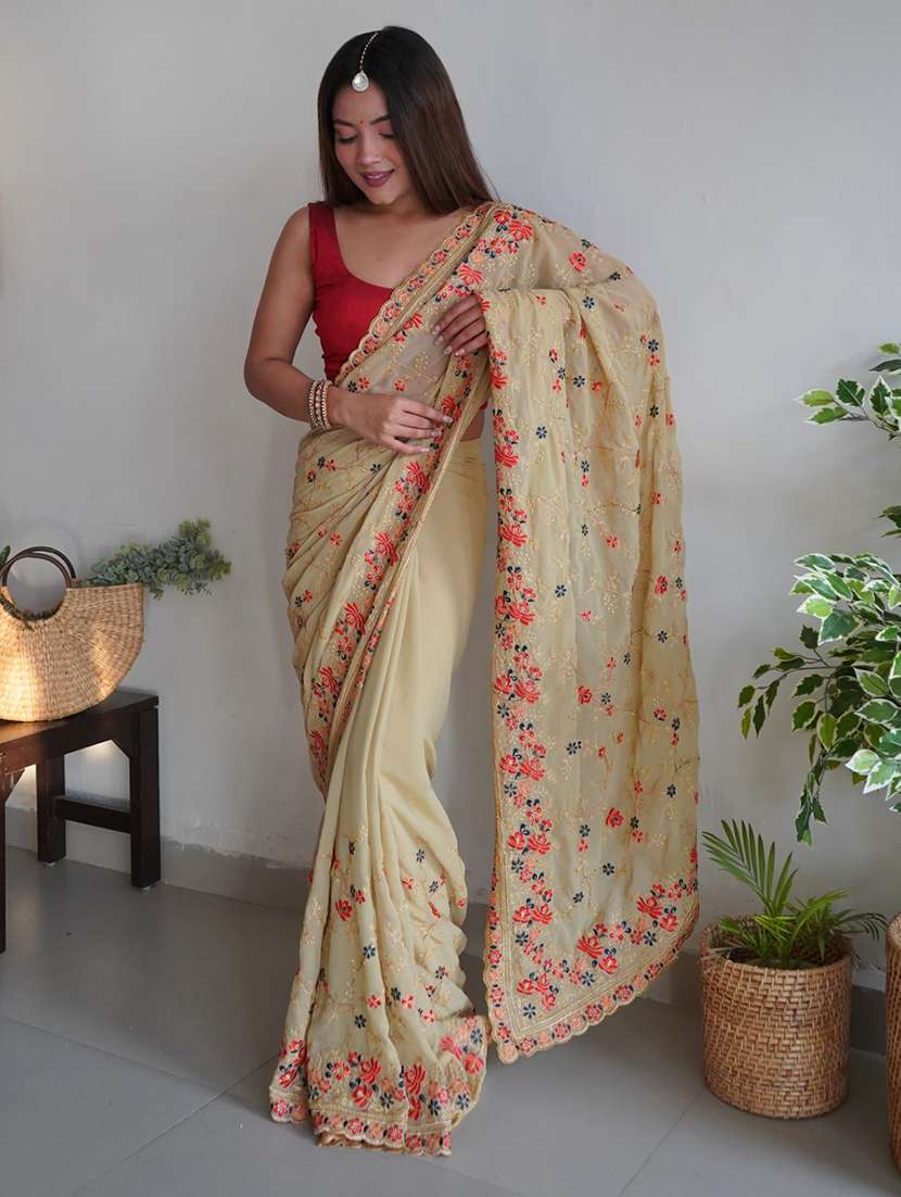 beige embroidered saree