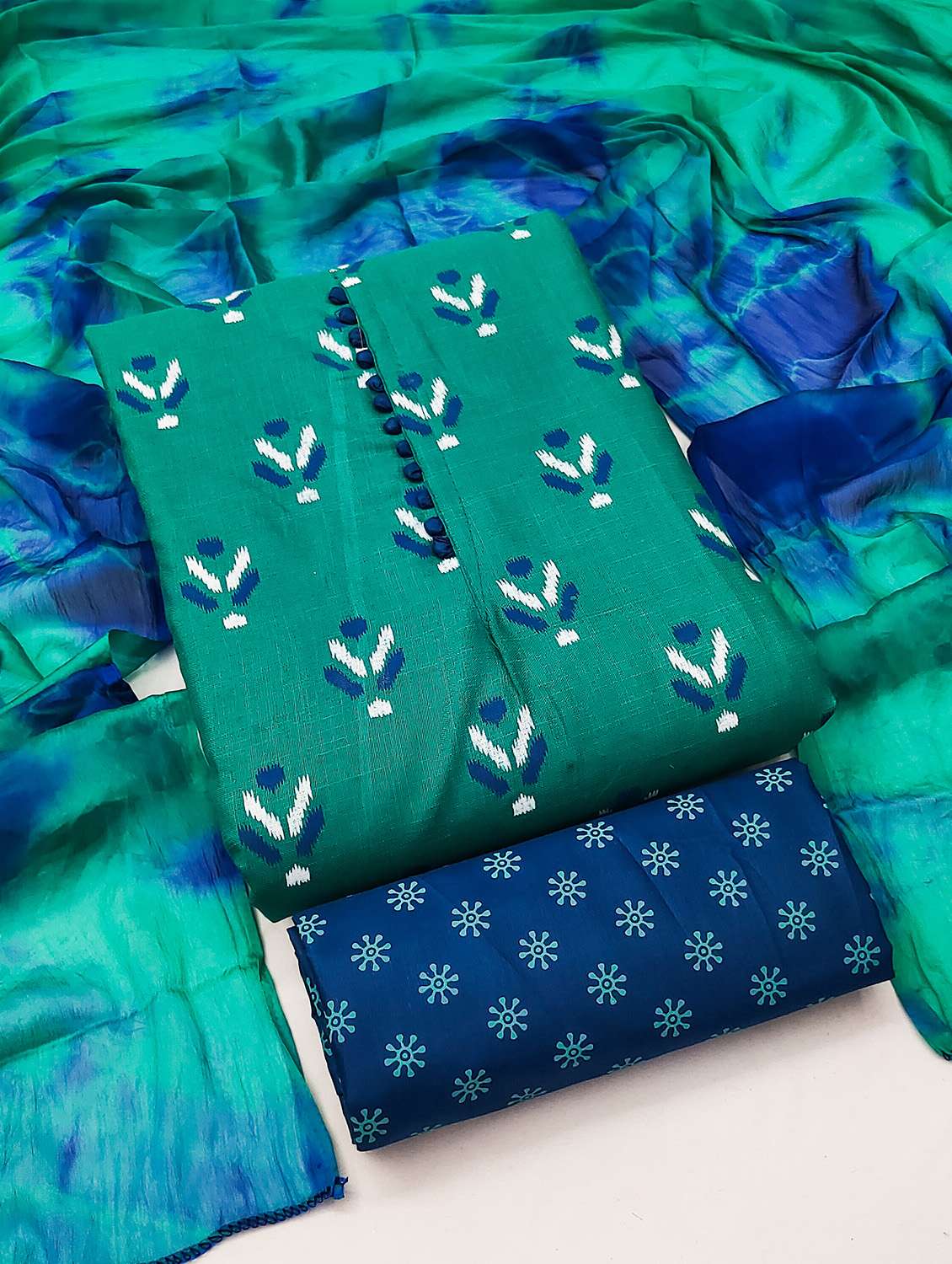 women green self design unstitched suit