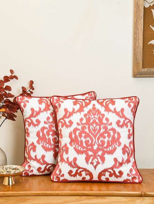 ratan cart peach cotton ikat embroidery 16x16 inch cushion cover set of 2