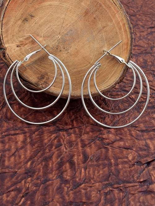 women silver brass hoop earring - 21143577 -  Standard Image - 0