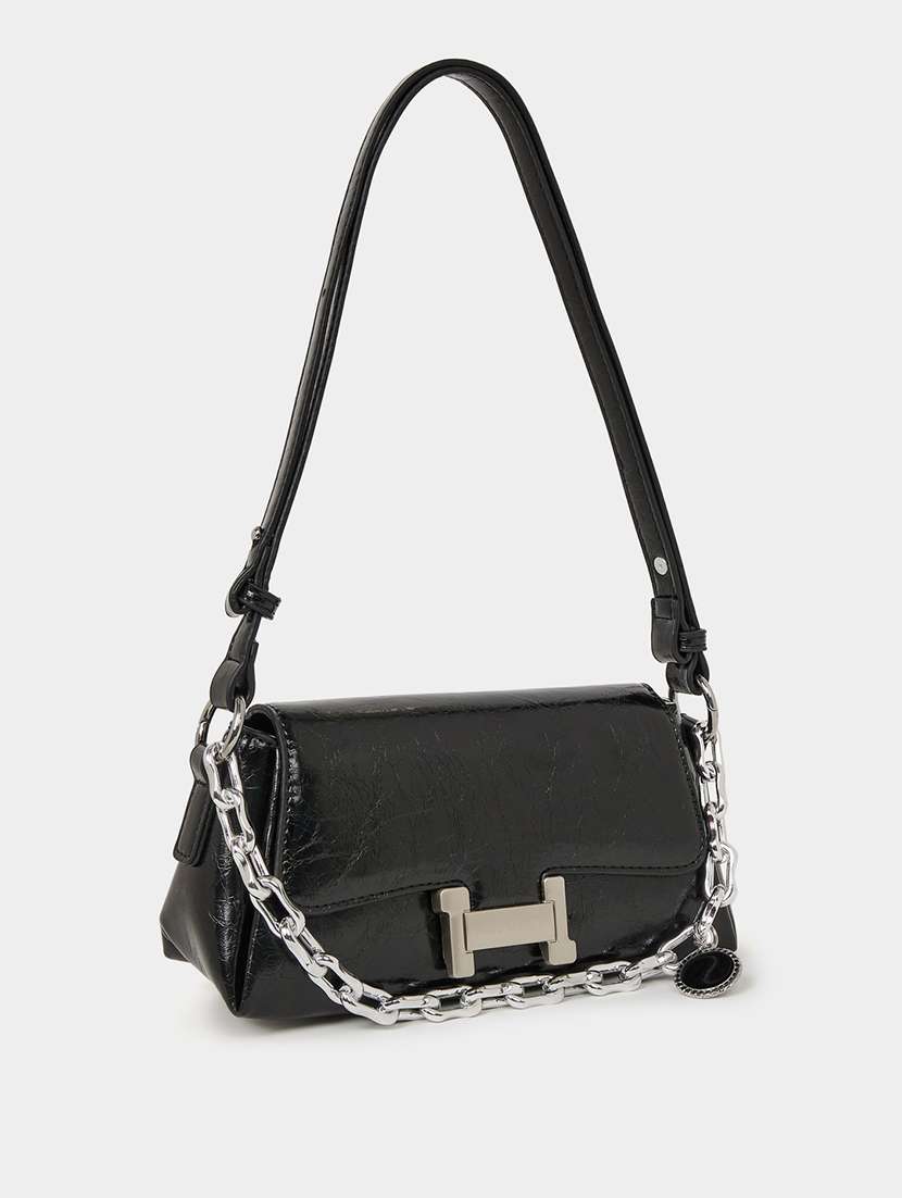 black textured handbag