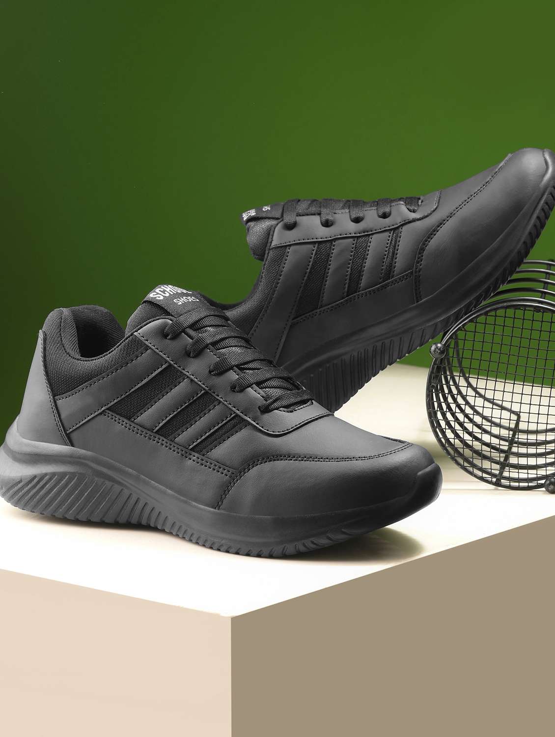 solid black sport shoes