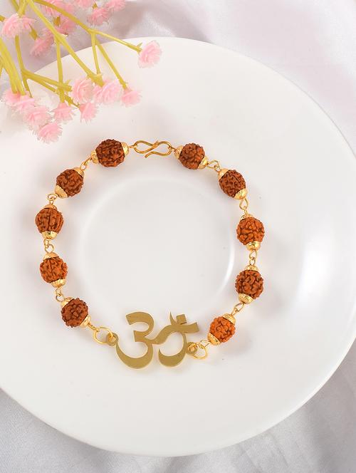 brass gold rudkraksh om hindu bracelet - 21155499 -  Standard Image - 0