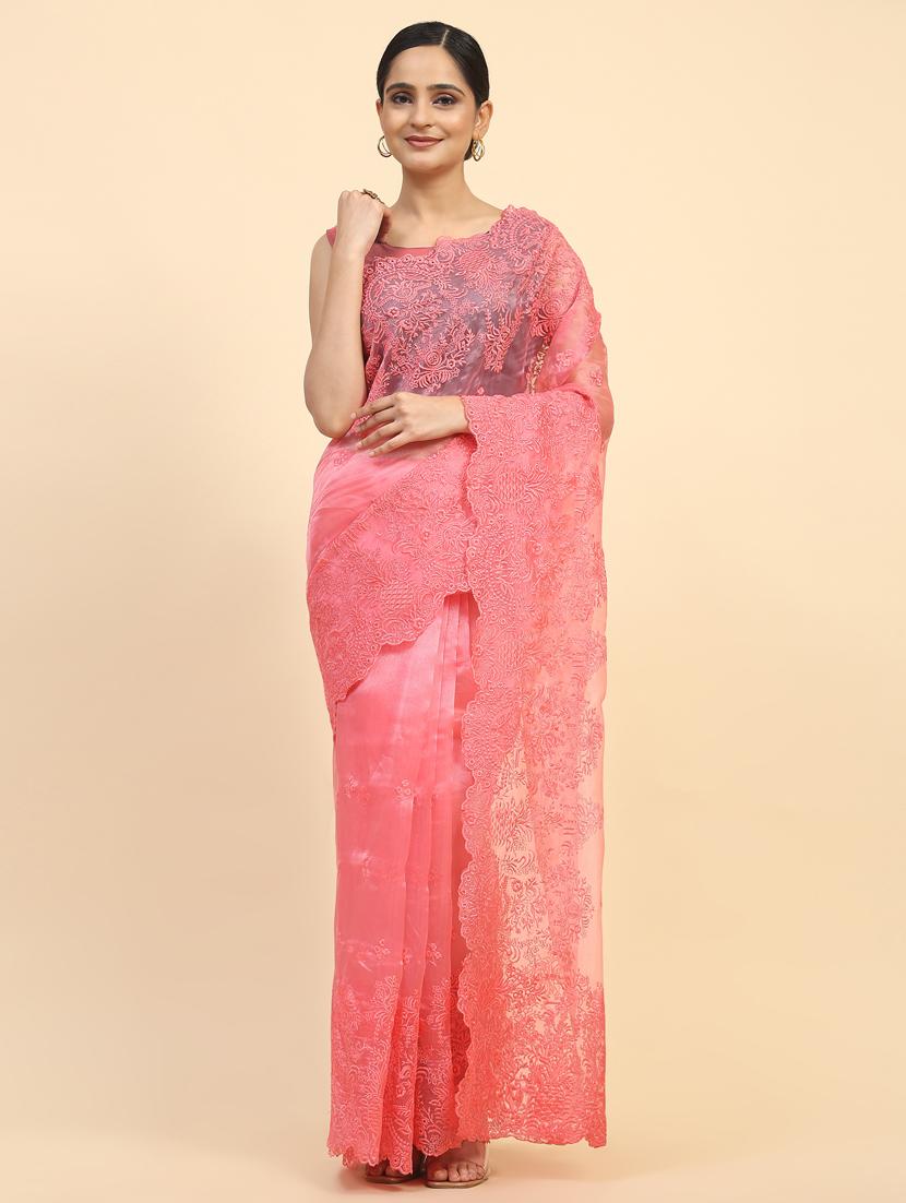 women peach embroidered saree with blouse