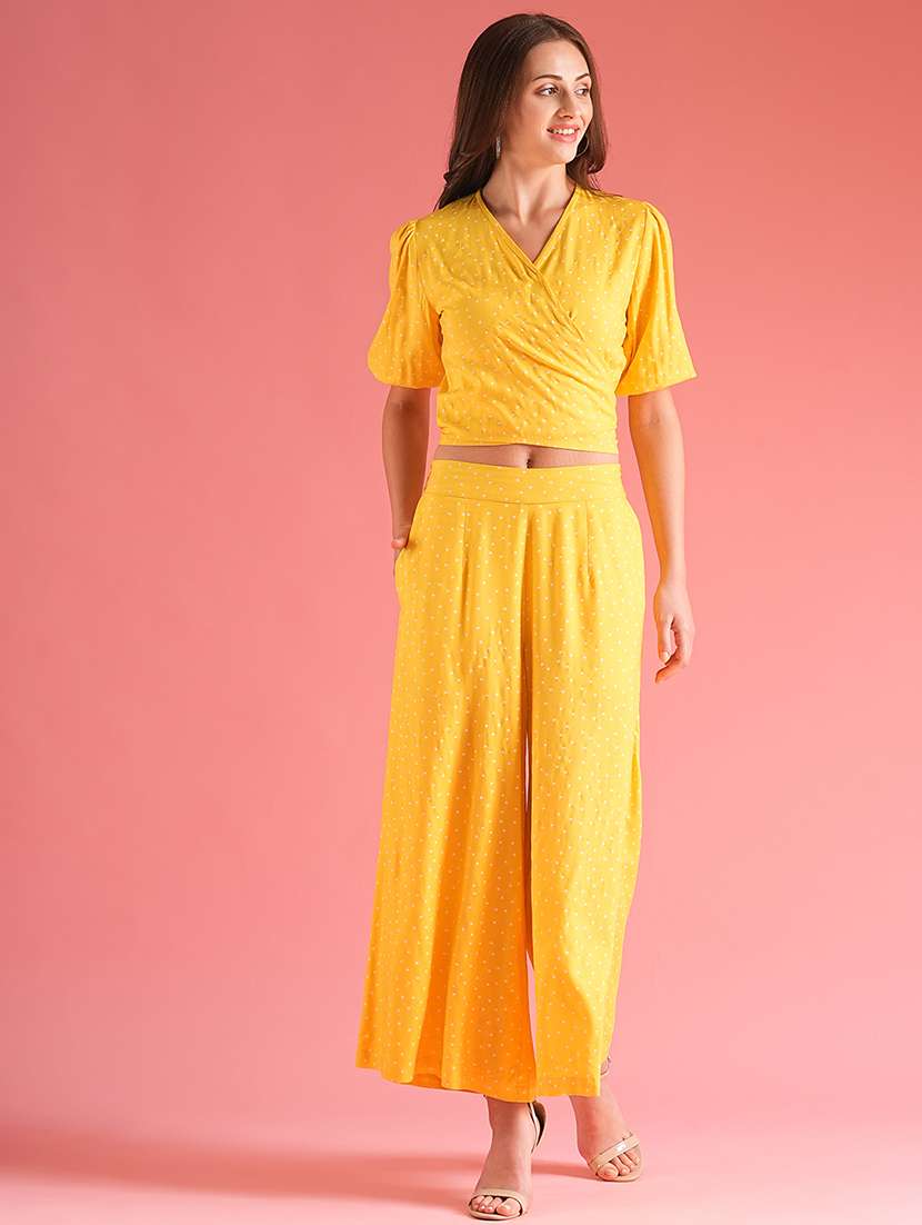 women polka doted top and palazzos co-ord set